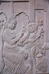 Relief, der forestiller den hinduistiske gud Krishna med sin stedmor Yashodha. Indien