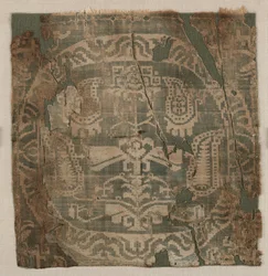 Rundel med kantet palmettræ, fra tunika, 650-850.