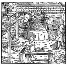 Adskillelse af bly fra sølv eller guld i en kuppelovn, 1556