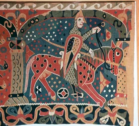Billede af gobelin, der viser en vikingerytter