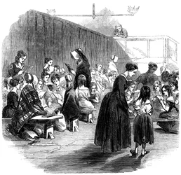 Lærer piger at læse i Ragged School Union-skolen, Lambeth, London, 1868