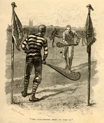 Målmanden forsøger at stoppe det., 1881.