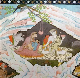 Den hellige familie sidder i en hule på Mount Kailasa