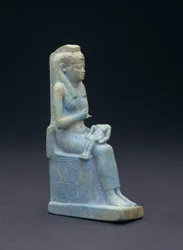 Figur af Isis, siddende på en trone, holder barnet Horus i sit skød, egyptisk, 26. dynasti, 664-525 f.Kr. (glasfarvet blå fajance)