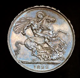 Sjælden britisk mønt, Kong George IV, Proof Silver Crown, Englands skytshelgen til hest med sværd i færd med at dræbe dragen, stemplet af Bernedetto Pistrucci