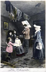 Velgørenhed: nonne besøger fattige mennesker, ca. 1910 (postkort)