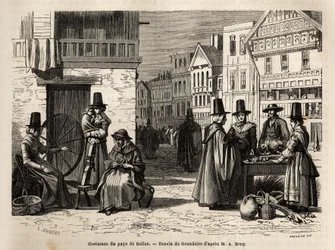 En gade i Wales med lokalbefolkningen klædt i traditionelle kostumer og hverdagsaktiviteter: en førstehåndsfamilie og kvinder, der spinder uld med hjul. Engravure pour illustrrer un voyage dans le pays de Wales, en 1862, af Alfred Erny, i "Le tour du monde