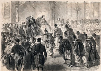 Kejser Napoleon III og impress Eugenie de Montijo modtog højtideligt de japanske ambassadører ved Tuilerierne i Paris den 13. april 1862. Indgravering i "Le Monde illustrious"" fra 1862. Privat samling.