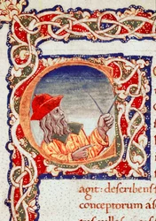 Den græske astronom Klaudios Ptolemaios (Claudius Ptolemaeus) (omkring 90-omkring 168 e.Kr.) bruger en passer til at foretage beregninger. Miniature fra »Cosmographia« (Ms. V.F. 32 f.2r), Napoli, Nationalbiblioteket