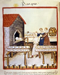 Sort brød: en bager på arbejde foran en ovn. Illustration fra bogen om medicin og diætetik, “Tacuinum sanitatis”.