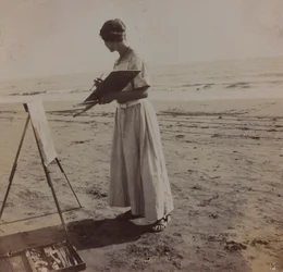 Ung maler på stranden i Forte dei Marmi, Italien