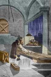 Præsten Pierre Aupetit anklaget for hekseri sat under tortur, før han blev brændt levende, 25/05/1588 (gravering)