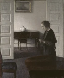 Interiør med en damelæsning, ca. 1900 (olie på lærred)