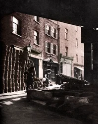 Frugtkurve stablet mod huse på Borough Market, London, 1926-1927