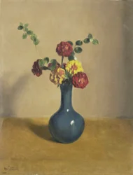 En buket morgenfruer i en blå vase
