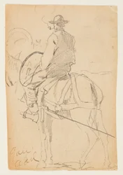 Mand rider på en hest