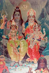 Gud Shiva og gudinden Parvati med deres søn Ganesha.
