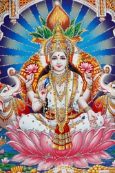 Lakshmi, Vishnus hustru, er gudinde for velstand, lykke og skønhed.